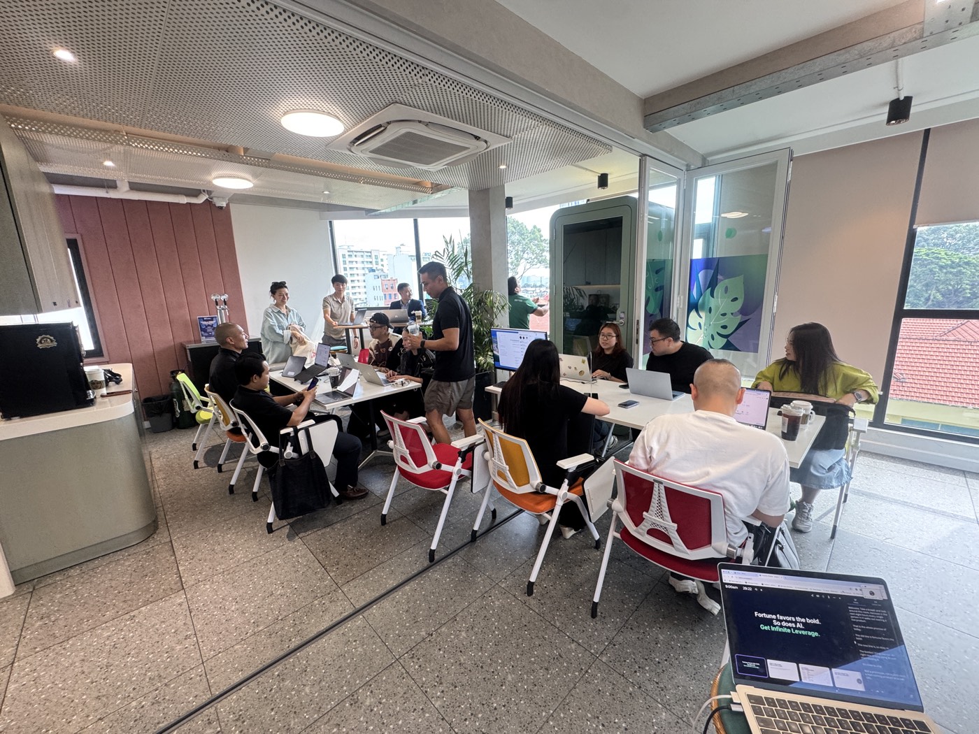 A working session, heads down at the tables